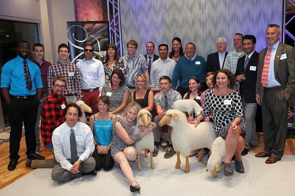 The Arcari family and other members of the Landry & Arcari Rugs and Carpeting from the Boston and Salem showrooms