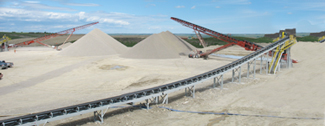 over land conveyors, aggregate stockpile, radial stackers, conveyor vs haul truck