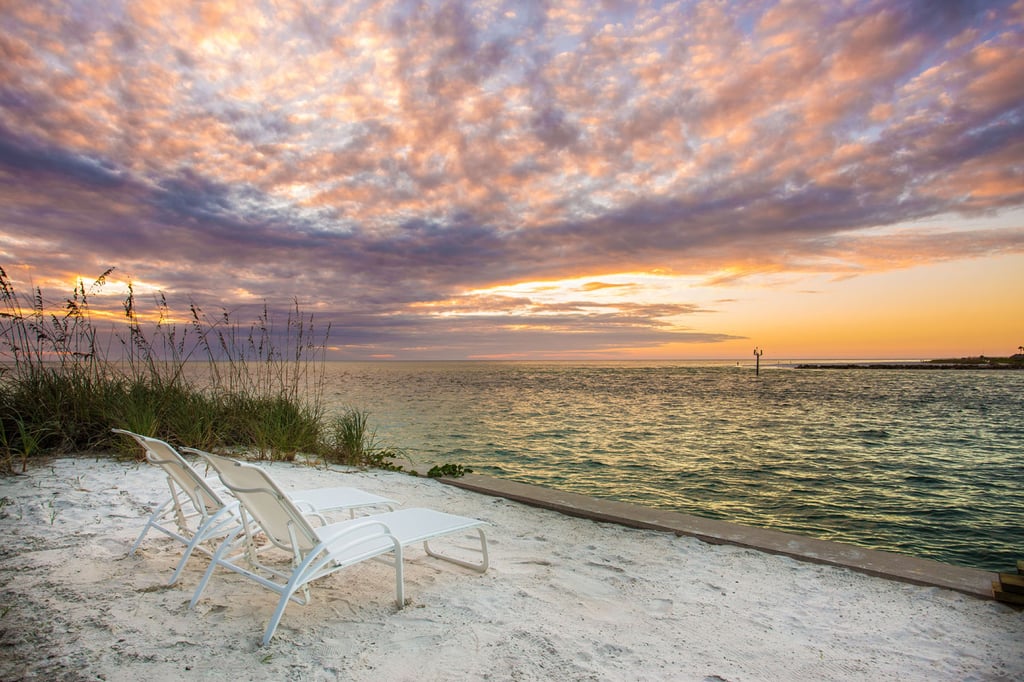 Unparalleled views of the Gulf are enjoyed from almost every room of this cheerful residence located only four and a half miles from Sarasota. Unparalleled views of the Gulf are enjoyed from almost every room of this cheerful residence located only four and a half miles from Sarasota.