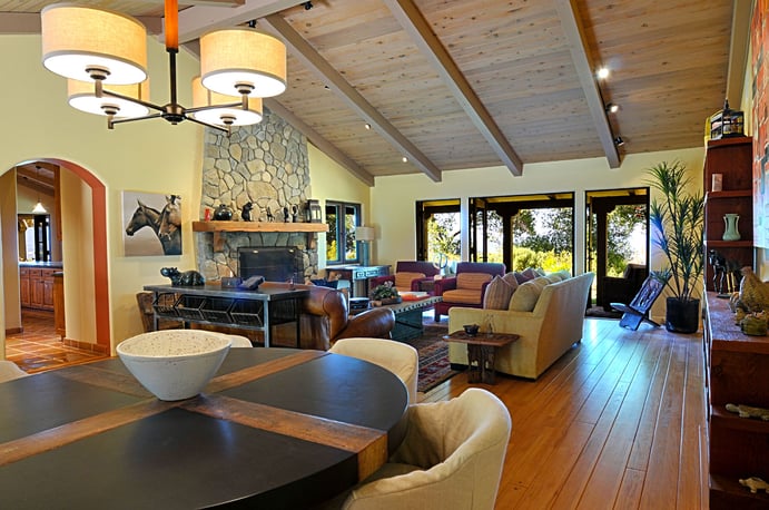 Interior living spaces have been renovated with vaulted ceilings to lend openness to the home. Interior living spaces have been renovated with vaulted ceilings to lend openness to the home.