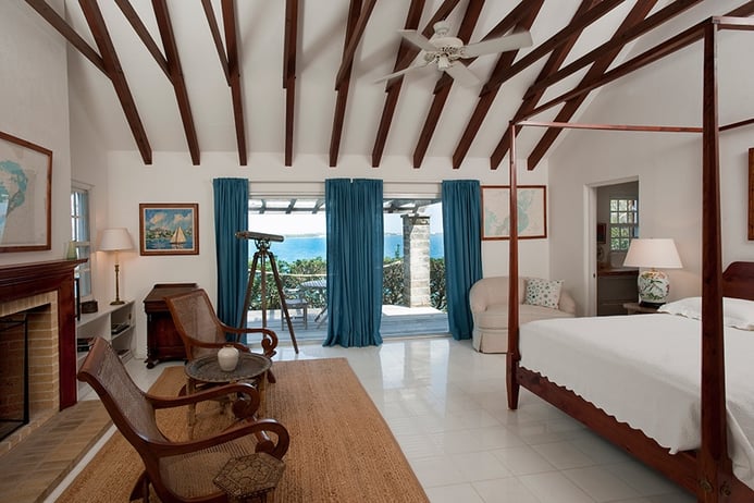 Shell Point in Tucker's Town is light-filled and airy, with Bermuda cedar details. The master bedroom has a pergola-covered terrace that overlooks the waterfront. Shell Point in Tucker's Town is light-filled and airy, with Bermuda cedar details. The master bedroom has a pergola-covered terrace that overlooks the waterfront.