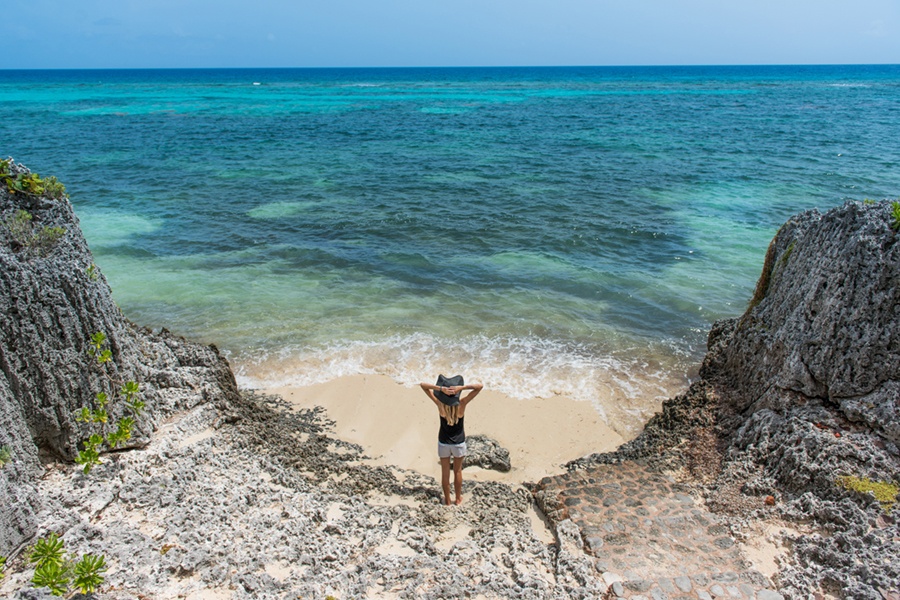 Coral seawalls form a natural perimeter around the property and create a sheltered cove within the private beach. Coral seawalls form a natural perimeter around the property and create a sheltered cove within the private beach.