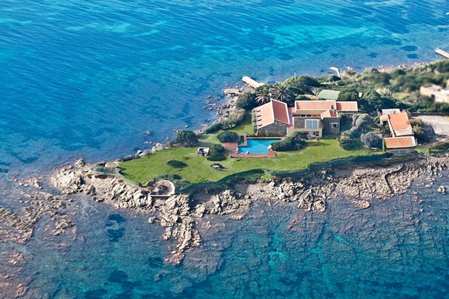 Nearly one and a half acres of gardens filled with flowers, greenery, and native Mediterranean plants enhance this elegant property. Nearly one and a half acres of gardens filled with flowers, greenery, and native Mediterranean plants enhance this elegant property.