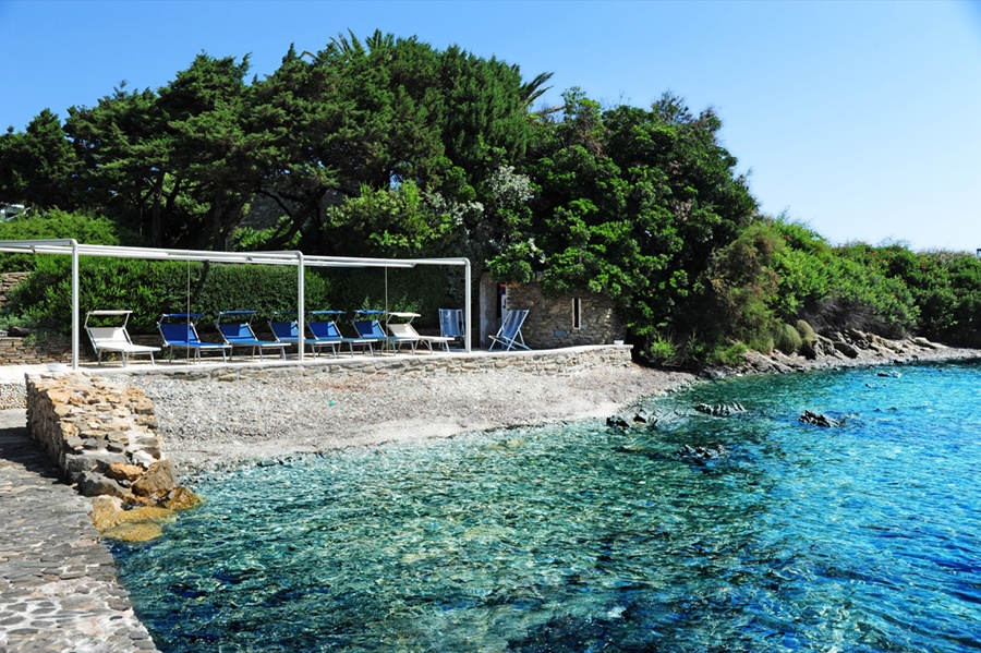 This luxurious sanctuary features not only a private beach but its own sun-deck with curtains and chaises. This luxurious sanctuary features not only a private beach but its own sun-deck with curtains and chaises.