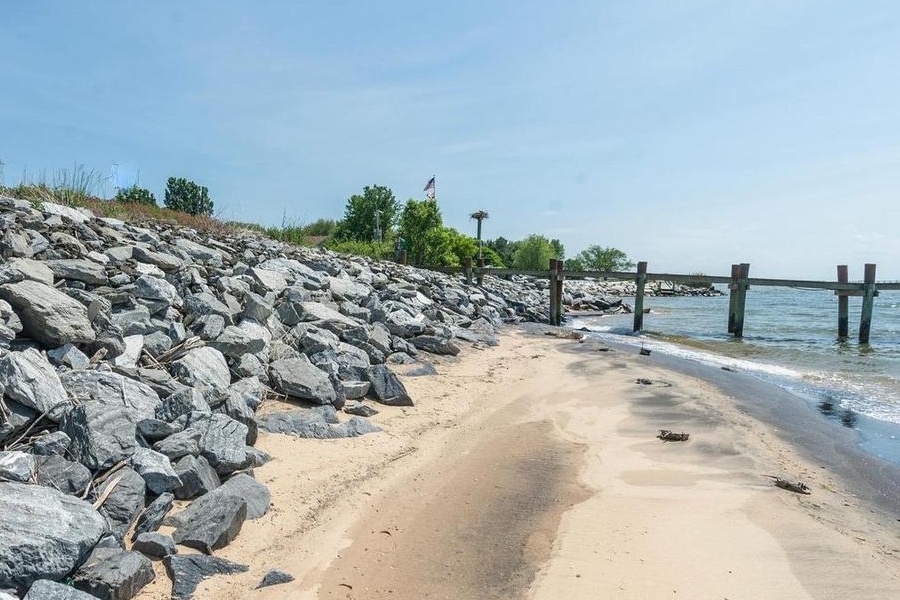 A secluded beach and deep-water dock make this Chesapeake Bay waterfront home an ideal escape from the city. A secluded beach and deep-water dock make this Chesapeake Bay waterfront home an ideal escape from the city.