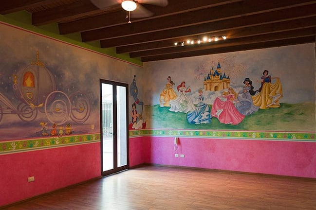 The children’s rooms of this Mexican estate are painted with colorful Disney-themed murals, and the children’s bathroom has a child-friendly, half-height sink. The children’s rooms of this Mexican estate are painted with colorful Disney-themed murals, and the children’s bathroom has a child-friendly, half-height sink.