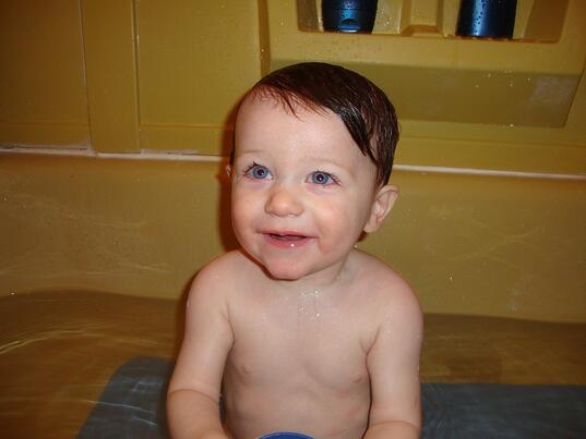 Happy Emmett in the tub baby in a tub