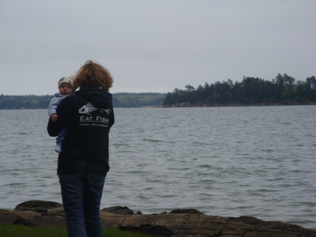 Emmett with Gran Lucy by the ocean.