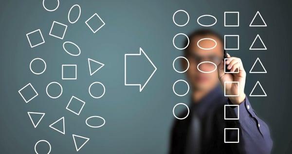 Picture of a man drawing shape to draw a diagram on screen