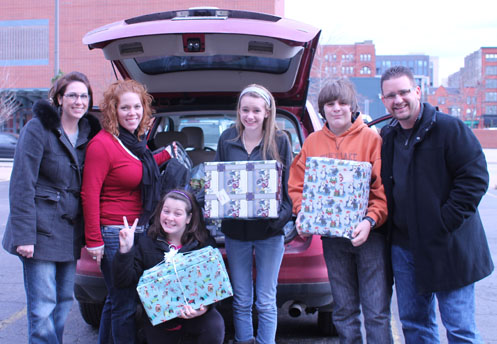 The MINDSCAPErs give back, delivering gifts to families in need through Family Promise of Grand Rapids