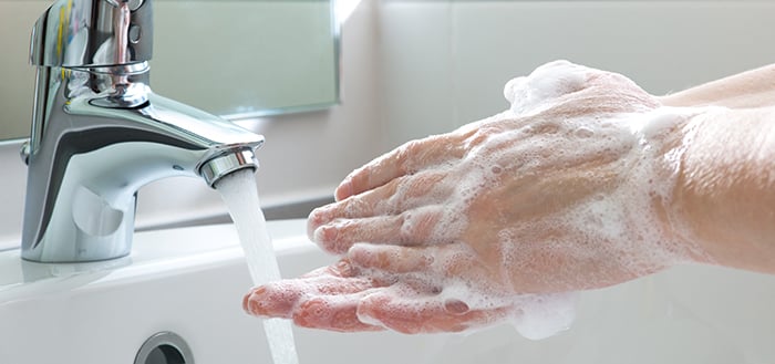 Hand-washing station [includes bucket with tap, bowl, and soapy water