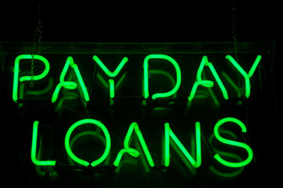 Green neon payday loans sign