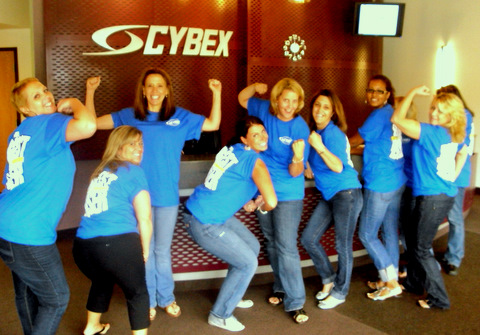 Cybex team posing Cybex team posing in strongman poses