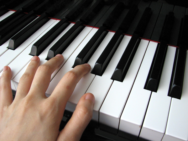 playing-grand-piano