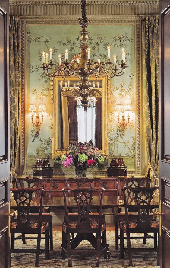 An Aubusson rug is a wonderful complement for Chippendale dining chairs and Chinoiserie wallcovering.