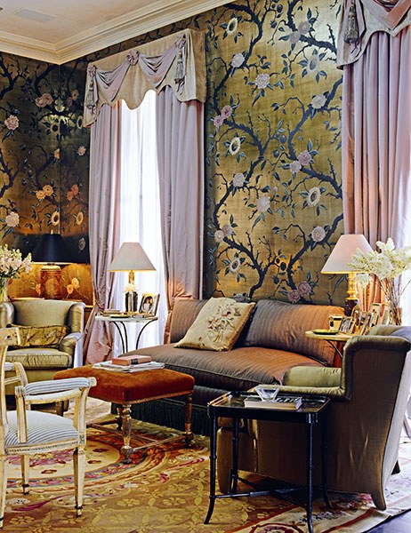 An Aubusson rug with golds, reds and a ornate medallion pattern is wonderful for pulling together rich fabrics while creating a modern vibe as in this drawing room designed by Nicky Haslam.