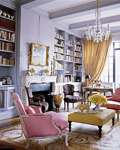 A cream and gold Aubusson rug provides a great setting for lavender walls and pink and gold upholstery.
