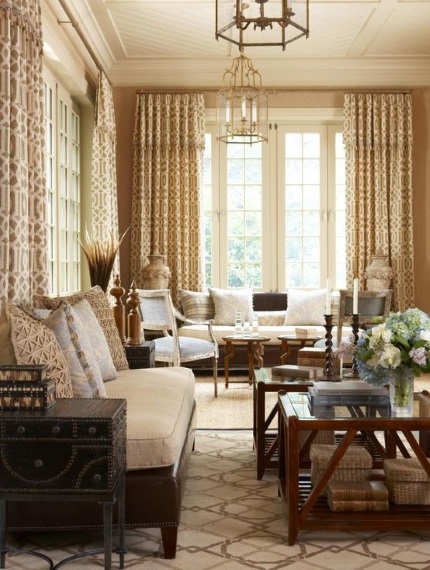 beige and brown geometric needlepoint rug in elegant sun room by Greenwich desginer Cindy Rinfret