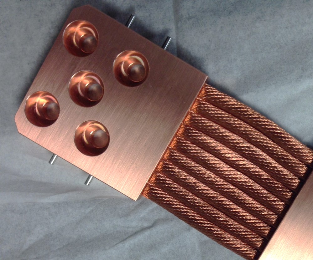 Custom heat strap with counterbored bolt holes 