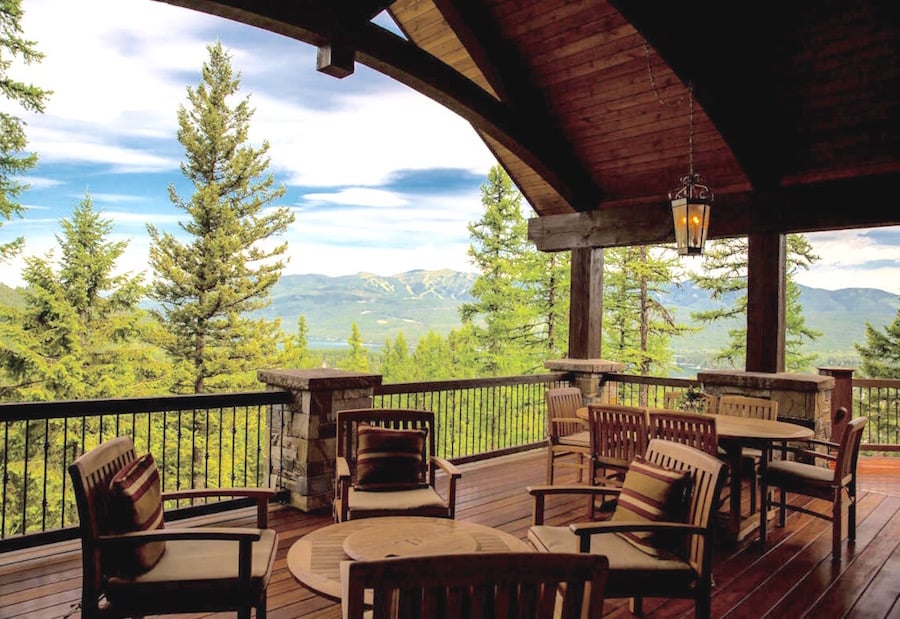 Treetop views and mountain air will whet any appetite, and this grand cabin  offers plenty of both.