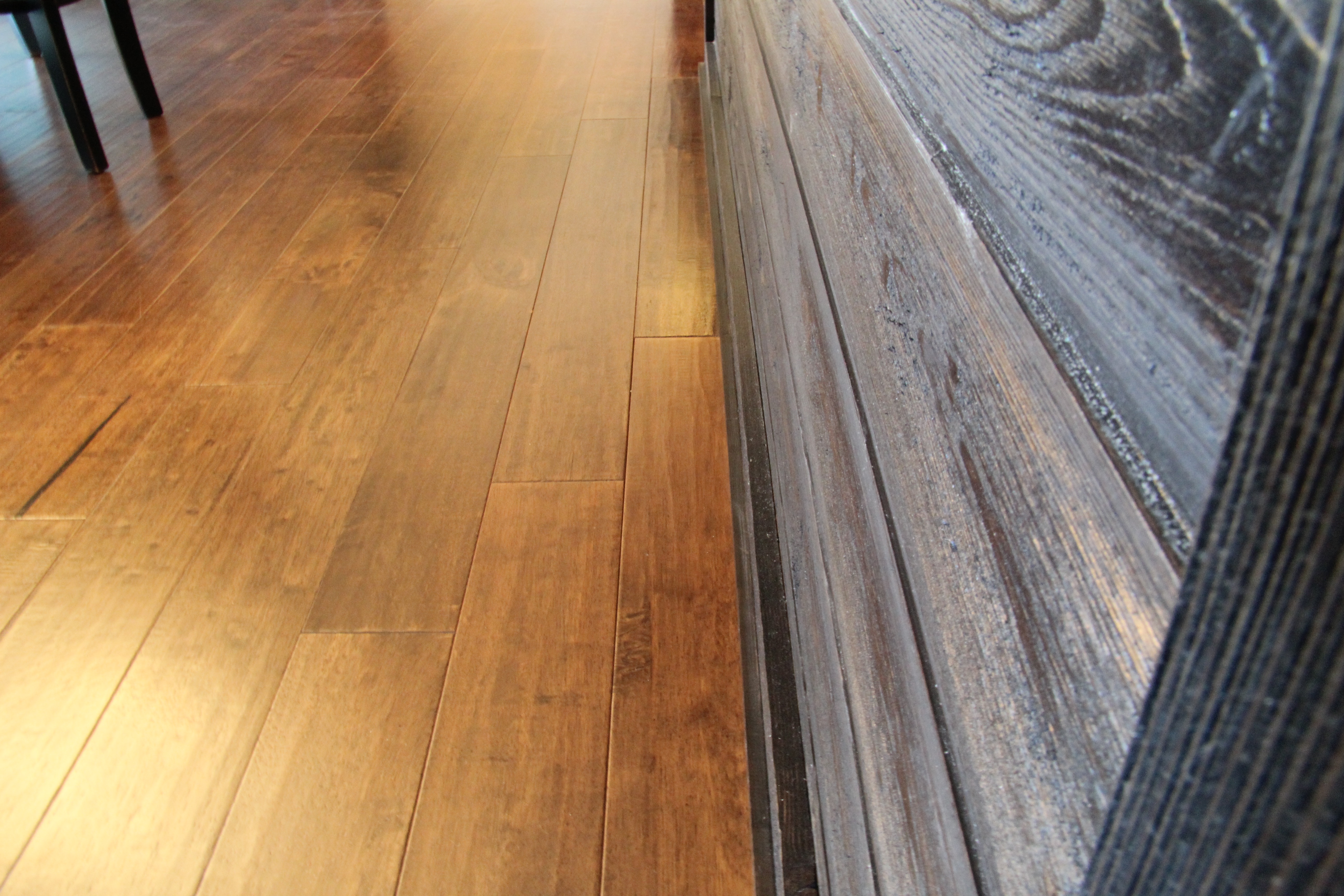 Reclaimed wood and hardwood look laminate flooring
