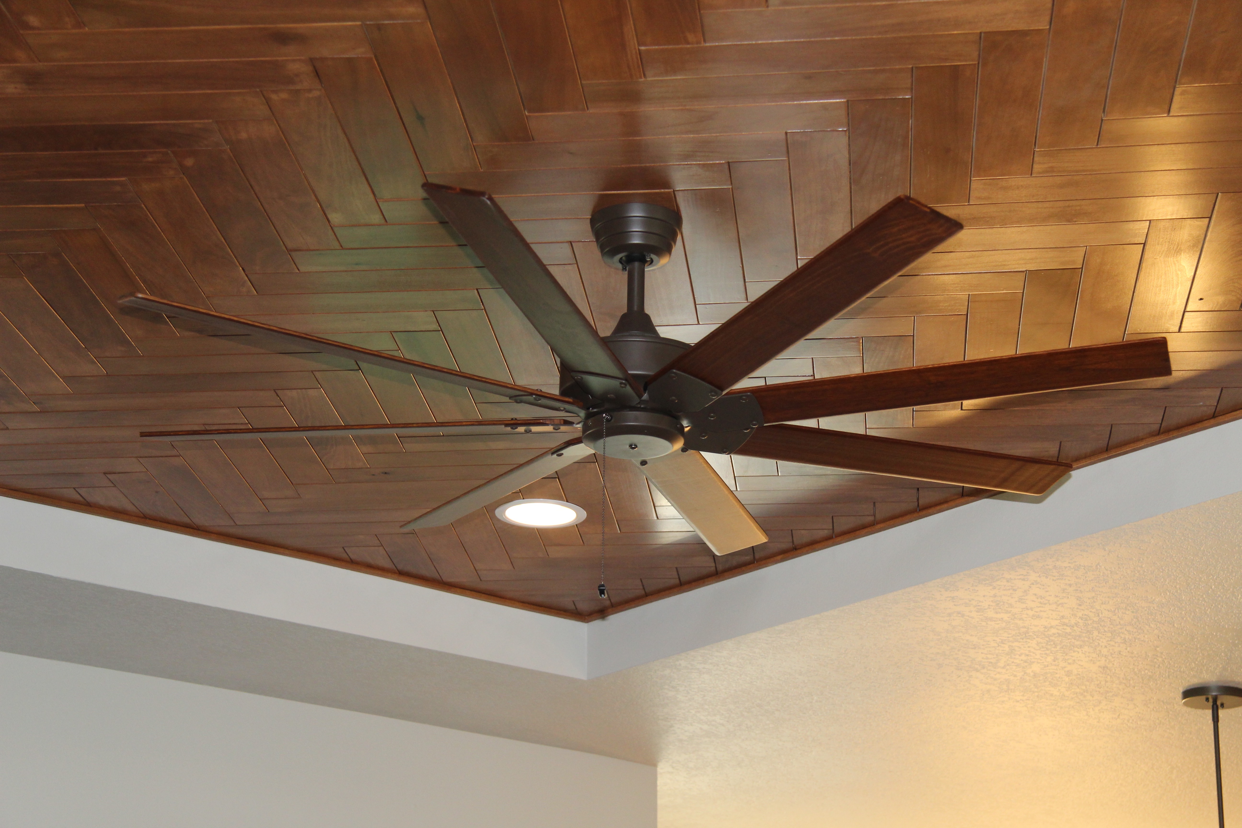 reclaimed wood used as inlay in tray ceiling