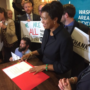 2_Mayor Bowser signs a bill into law-879634-edited.png