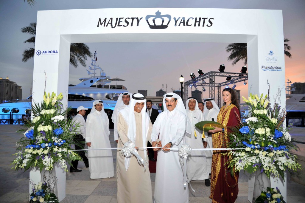 Qatar's Minister of Culture, Dr. Hamad Abed Al Aziz Al Kuwari with the Chairman of Gulf Craft Mohammed Alshaali at the grand opening in 2013.