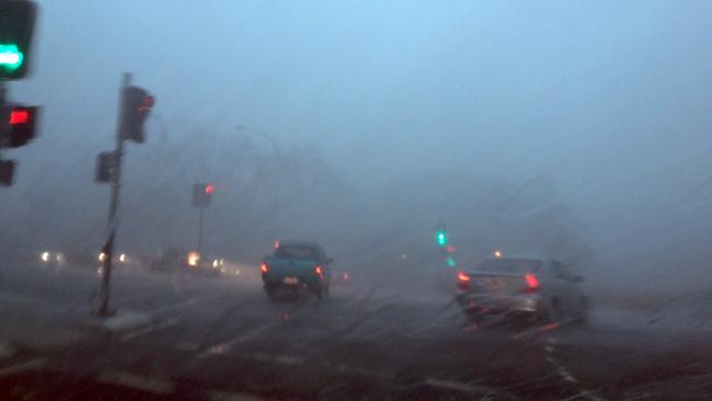 Rain storm blurred windscreen view