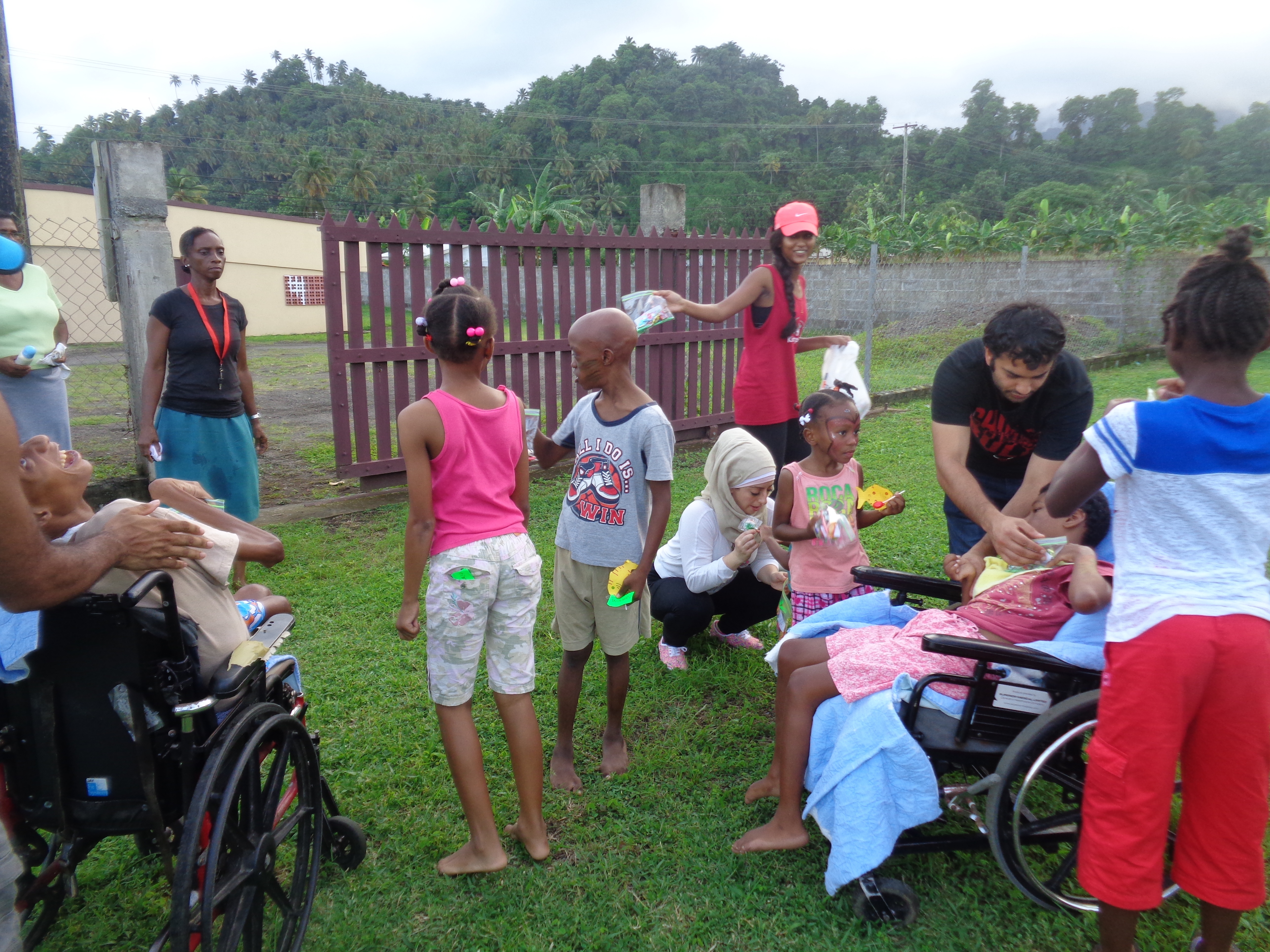 Trinity students with the kids and their prizes.