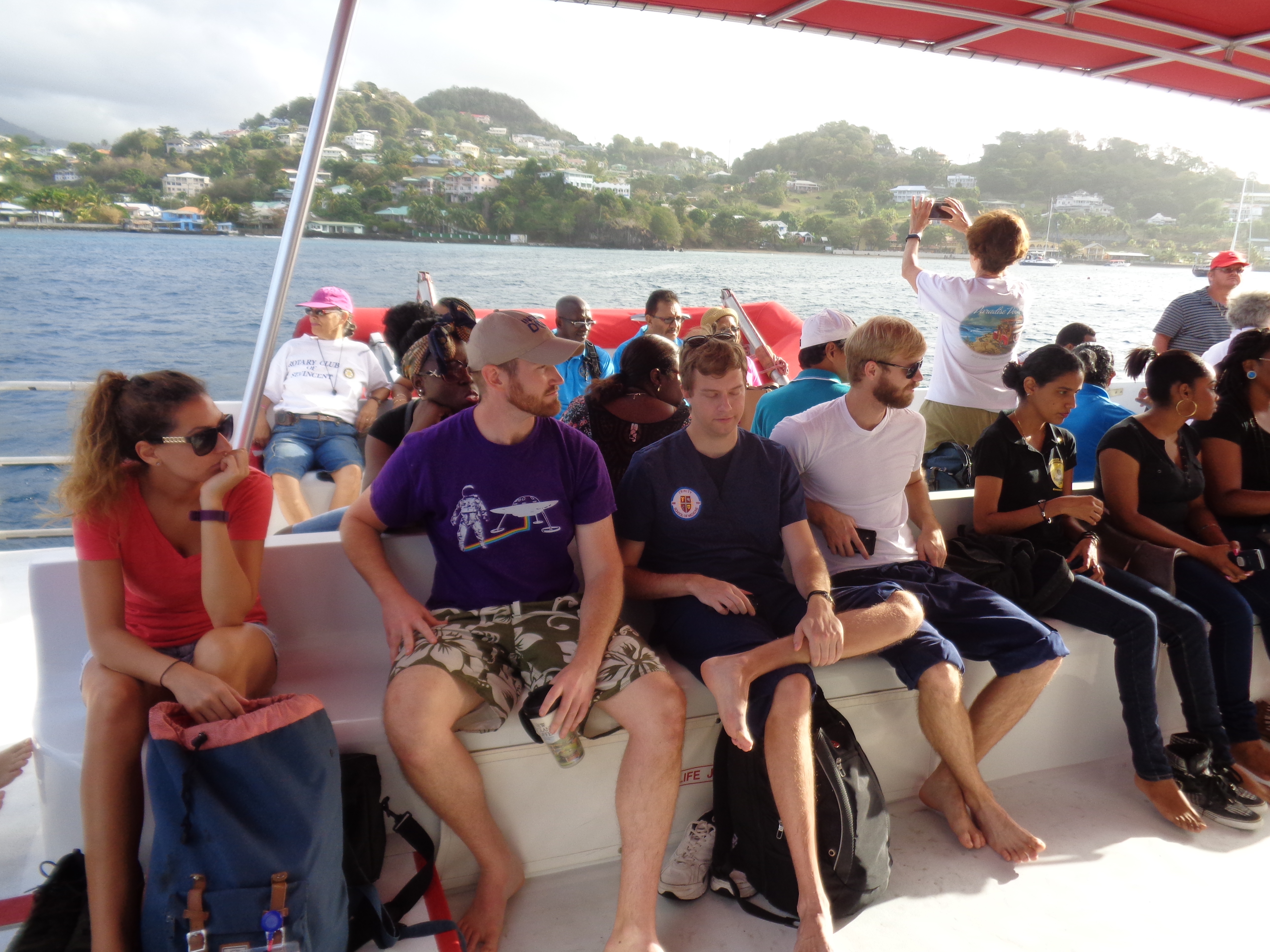 Students_and_other_volunteers_on_board_vessel_taking_them_to_Mayreau.jpg
