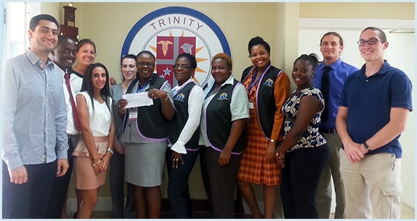 Trinity Presents Check to Kourageous Kids Foundation