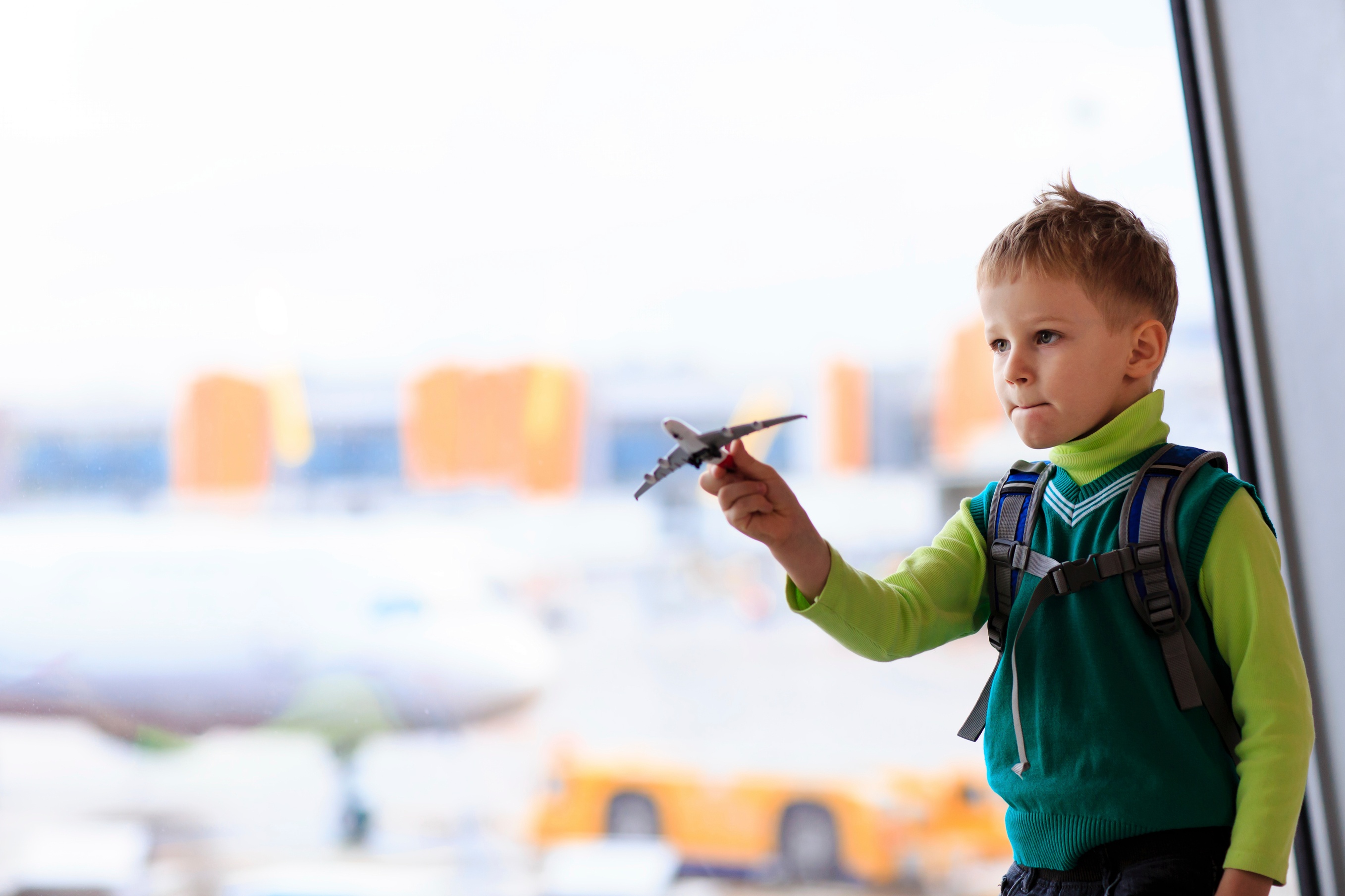 child-playing-airplane-student.jpg