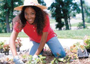 woman-gardenining-with-plants self-care woman gardening with plants