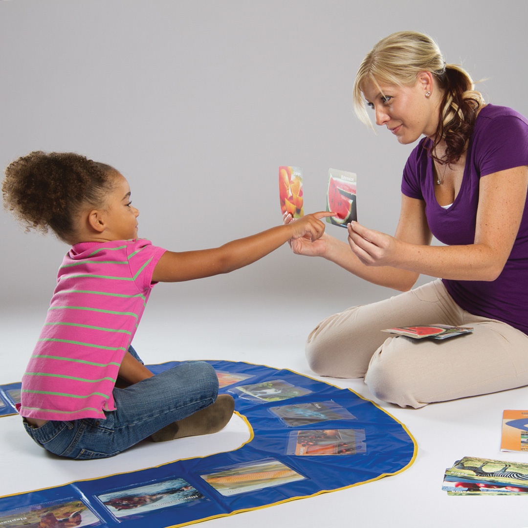 UPlay-Mat.jpg woman using Stages Learning U-Play Mat with autistic girl