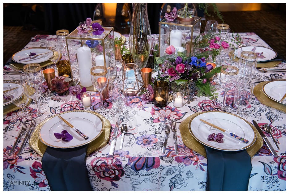 Glimmering Gold Charger Plates with Bold Print Table Event Decor | BBJ Linen