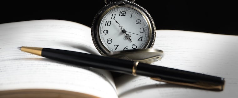 Book pen and clock
