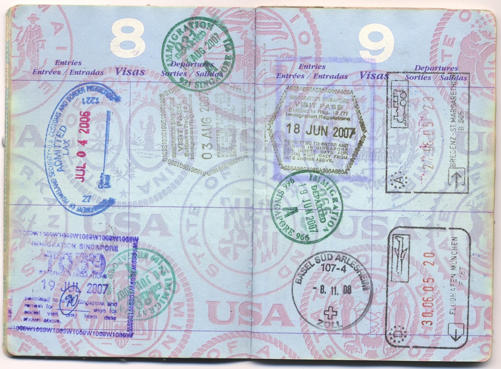 USA_passport_with_immigration_stamps_from_Austria_Germany_Singapore_and_the_US_-_20120708.jpg