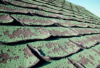 istock_roof_-_damaged_shingles_-_algae