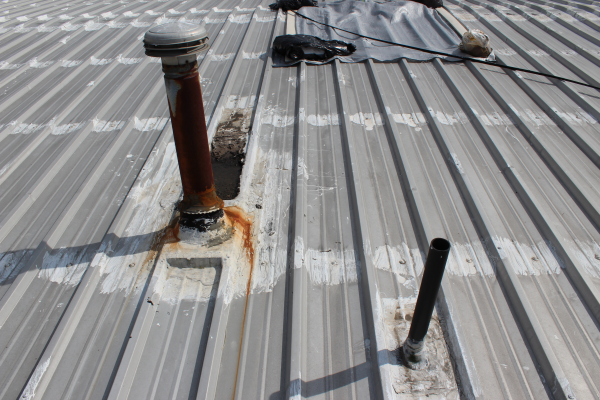 Problems With Metal Roofs And What To, How To Seal Corrugated Metal Roof Seams