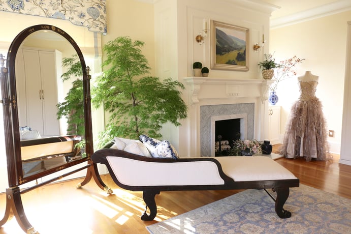 This California home’s walk-in wardrobe and dressing room is appointed with custom-designed built-ins including several closets, a center island, and banquette; chandeliers and huge windows provide ample light. This California home’s walk-in wardrobe and dressing room is appointed with custom-designed built-ins including several closets, a center island, and banquette; chandeliers and huge windows provide ample light.