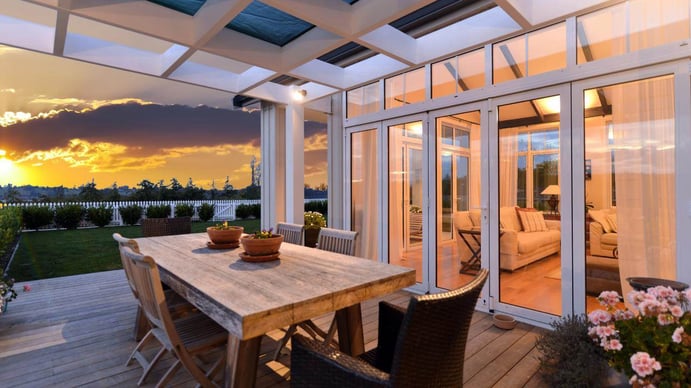 The sun’s rays illuminate this award-winning New Zealand home’s outdoor deck that enjoys views of snowcapped Mt. Arthur. The sun’s rays illuminate this award-winning New Zealand home’s outdoor deck that enjoys views of snowcapped Mt. Arthur.