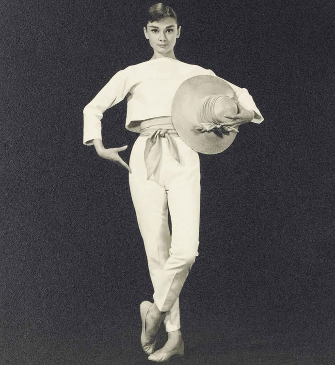 <b>FUNNY FACE, 1957</br>BUD FRAKER (1916-2002)</br><em>Audrey Hepburn</em></b></br> gelatin silver print</br> stamped photographer’s Paramount studio credit (verso)</br> 13 ¾ x 10 3/4 in. (34.9 x 27.3 cm.)</br> Estimate: £1,000-1,500 <b>FUNNY FACE, 1957</br>BUD FRAKER (1916-2002)</br><em>Audrey Hepburn</em></b></br> gelatin silver print</br> stamped photographer’s Paramount studio credit (verso)</br> 13 ¾ x 10 3/4 in. (34.9 x 27.3 cm.)</br> Estimate: £1,000-1,500