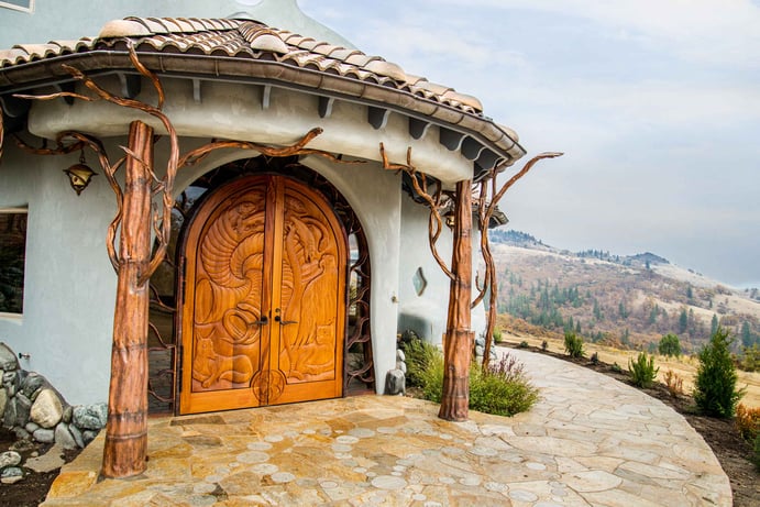 The striking 8,880-square-foot residence that stands at the center of Shining Hand Ranch is a work of art handcrafted from exotic wood and river rock to evoke the flow of nature. The striking 8,880-square-foot residence that stands at the center of Shining Hand Ranch is a work of art handcrafted from exotic wood and river rock to evoke the flow of nature.
