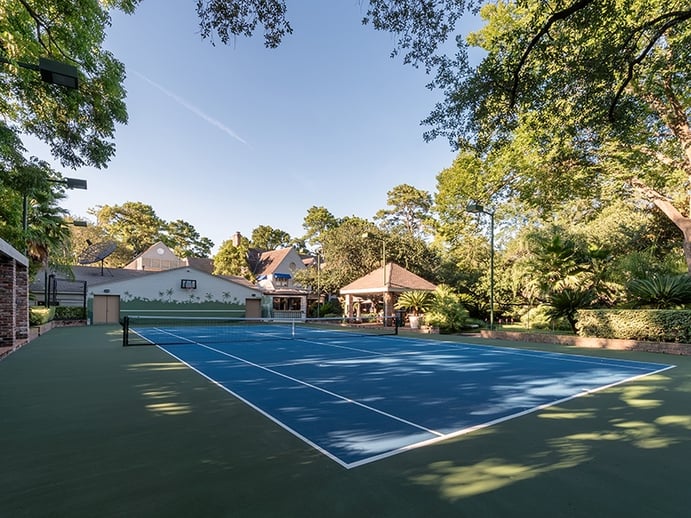 9 West Lane also has a fully lit tennis court and small golf course on the property. Photograph: Nan and Company Properties 9 West Lane also has a fully lit tennis court and small golf course on the property. Photograph: Nan and Company Properties