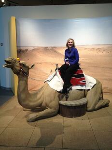 WHO Reporter, Megan Salois, having her photo taken with the fiberglass Camel