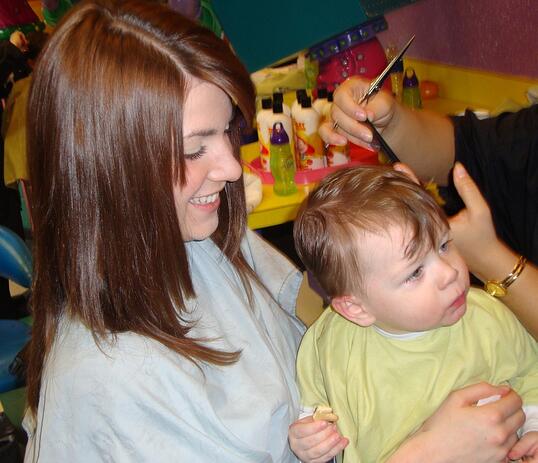 First Haircut on Mom's Lap