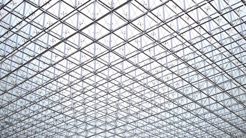 The image depicts square patterned glass celling 