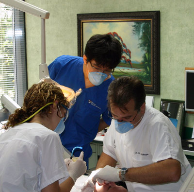 Doctor and staff treat patient