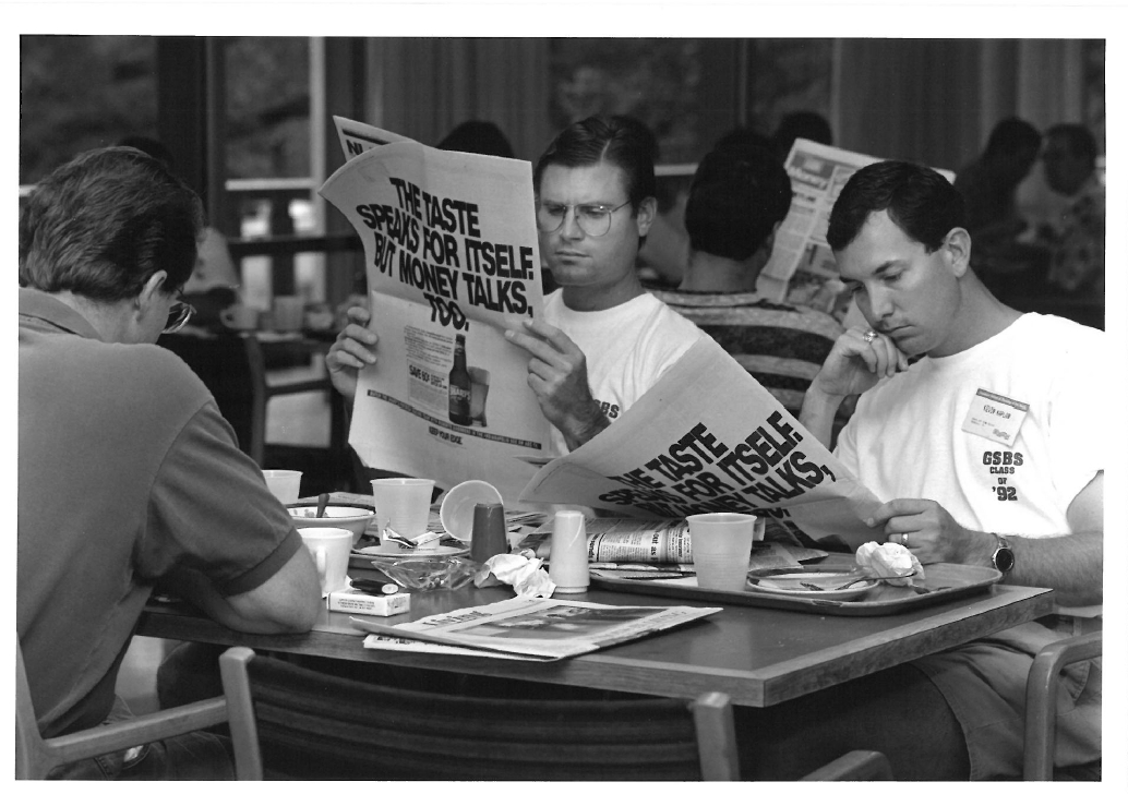Two members of the Class of ’92, catching up on the news at breakfast
